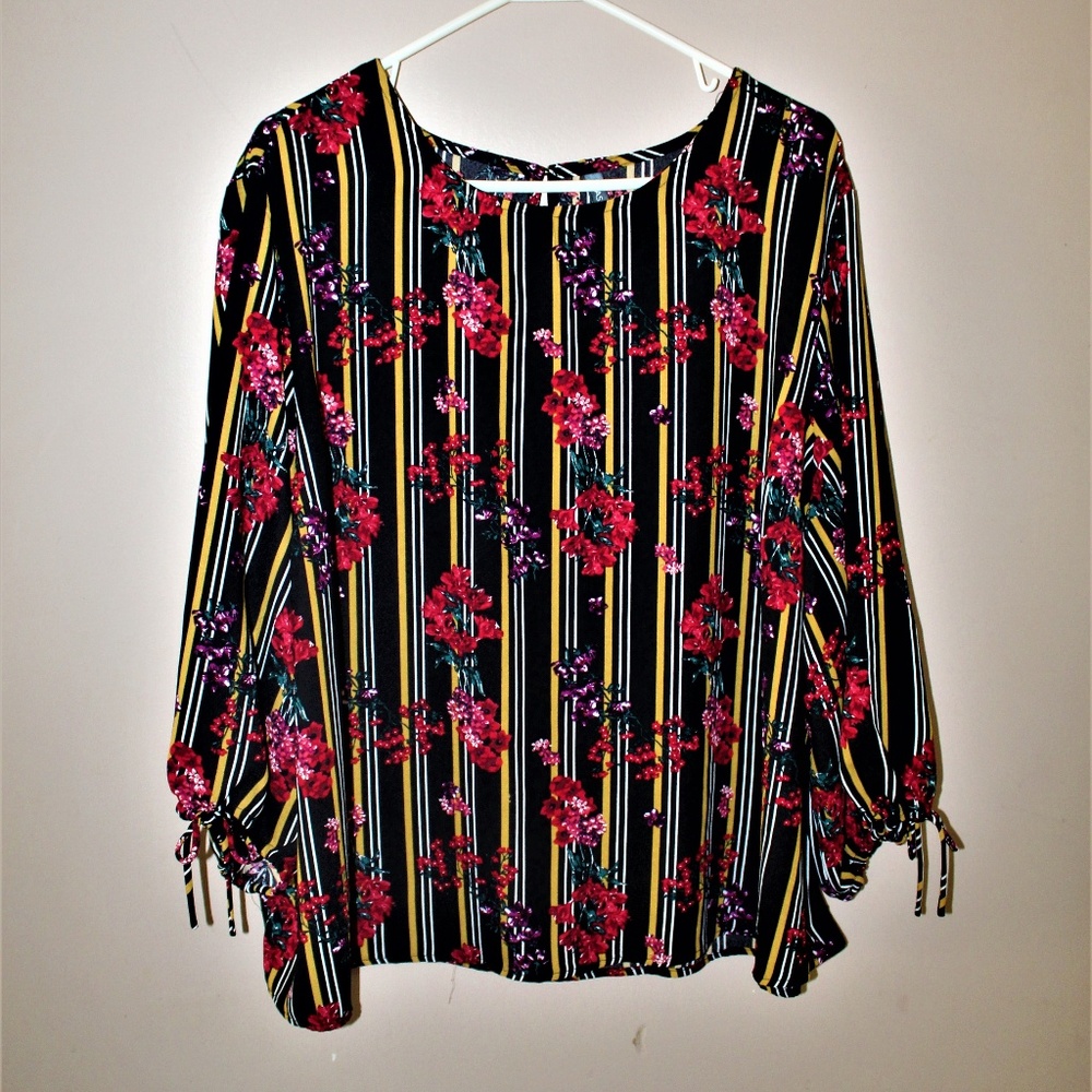 Black with yellow and white stripes, floral blouse